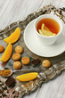 Healthy tea with lemons, chocolate and cookies
