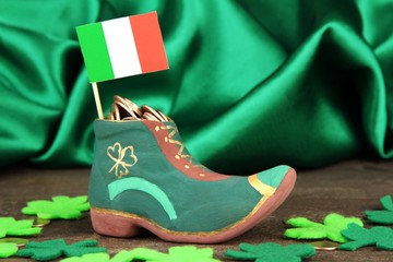 Saint Patrick day boot with gold coins and clover leaves