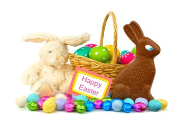 Happy Easter card with Easter basket, candies and toy bunny