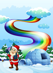 Sticker - A smiling Santa near the igloo with a rainbow in the sky