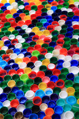 Sticker - color plastic caps background