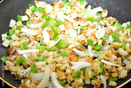 Cooking Home Fries With Onions And Green Peppers Buy This Stock
