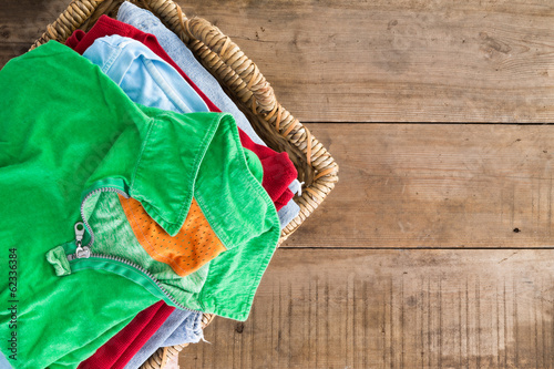 Fotografie, Obraz Clean unironed summer clothes in a laundry basket