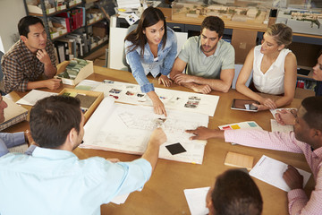 Poster - Female Boss Leading Meeting Of Architects Sitting At Table