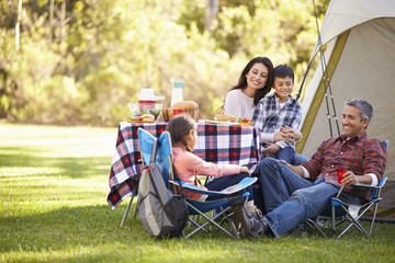 Wall Mural - Family Enjoying Camping Holiday In Countryside