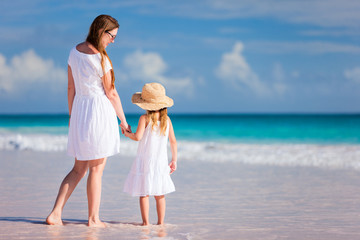 Wall Mural - Mother and daughter at beach