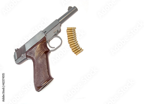 Poster Small 22 caliber handgun with bullets.Isolated on white.