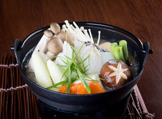 japanese cuisine. hot pot on the background