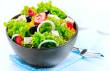 Fototapeta Tulipany - Mediterranean Salad. Greek Salad isolated on a White Background