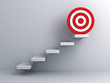 Steps with goal target business concept over white wall