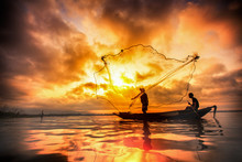 Fisherman Of Bangpra Lake In Action When Fishing