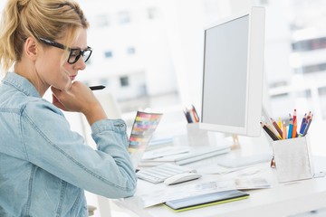 Sticker - Blonde focused designer working at her desk