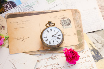 old letter  with  old clock