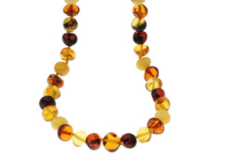 Amber necklace with backlighting isolated on white