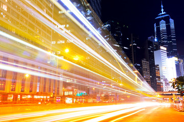 Busy traffic in modern city at night