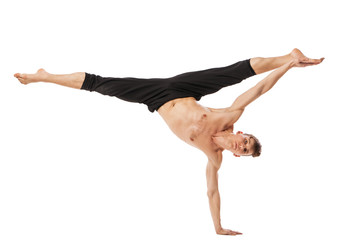 modern ballet dancer posing over white background