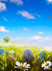 Wall Mural - art  easter eggs on spring field