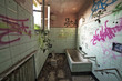Dirty and decayed bathroom in abandoned house