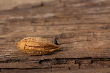 Almond on wooden board