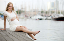   Pregnancy Woman At Sea Port