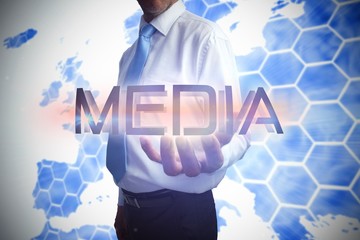 Aufkleber - Businessman presenting the word media