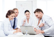 © Syda Productions - business team having meeting in office