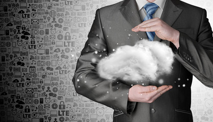 Wall Mural - Cloud computing concept, close up of young businessman