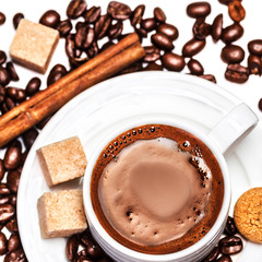 Poster - Coffee cup with coffee beans and biscotti isolated on white back