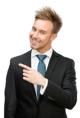 Wall Mural - Half-length portrait of businessman pointing finger gesture