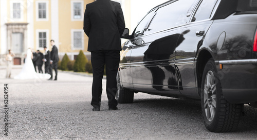 Black limo at wedding Poster Mural XXL