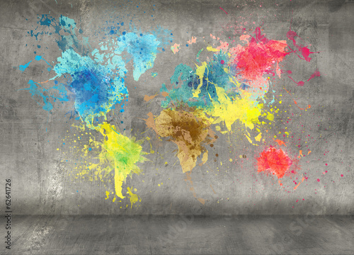 world map made of paint splashes on concrete wall background