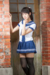 © imagesbykenny - Asian schoolgirl in uniform outside school
