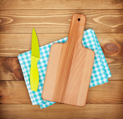 Wall Mural - Cutting board and knife over kitchen towel