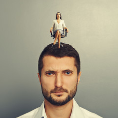 Sticker - man with serious woman on his head