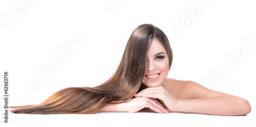 Fényképezés Beautiful young woman with long hair isolated on white