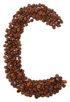 Alphabet from coffee beans isolated on white