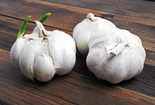 Organic Garlic On The Wooden Background