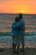 Elderly couple at sunset