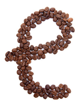 Alphabet from coffee beans isolated on white