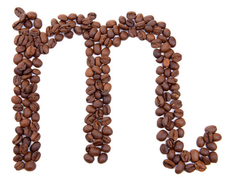 Alphabet from coffee beans isolated on white