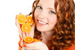 © GTeam - Portrait of a beautiful young woman with red hair oranges