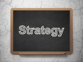 Finance concept: Strategy on chalkboard background