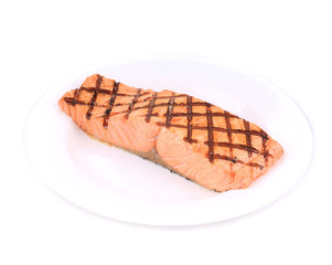 Sticker - Fried salmon fillet on plate.