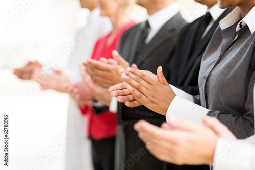 Fotomural group of businesspeople clapping hands