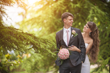 Bride and groom at wedding day in summer