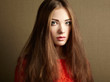 © Oleg Gekman - Portrait of beautiful dark-haired woman close up.