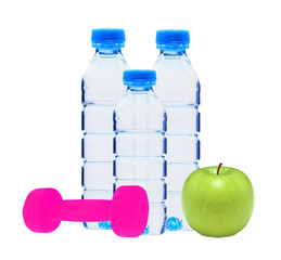 Wall Mural - Blue bottles with water, dumbell and green apple isolated on whi