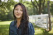 © Mint Images - A young woman on a traditional farm in the countryside of New York State, USA