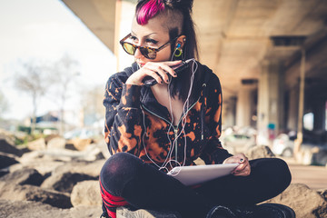 Wall Mural - young beautiful punk dark girl using tablet