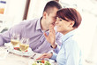© Kalim - Happy couple in a restaurant